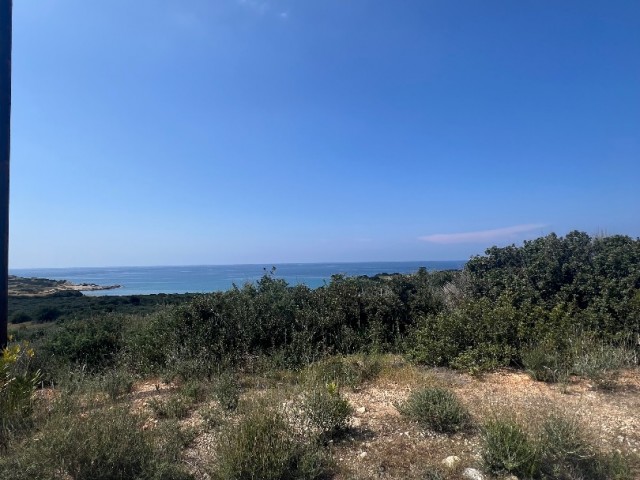 15 DECLARES OF LAND FOR SALE NEXT TO THE OPEN SEA IN ISKELE/KAPLICA..0533 859 21 66
