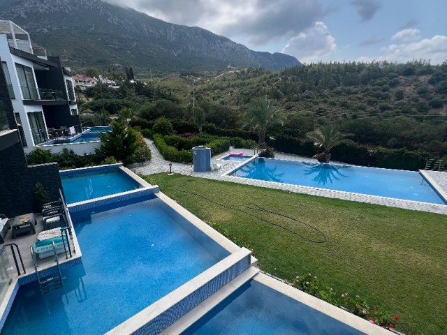 VOLLSTÄNDIG MÖBLIERTE 2+1-WOHNUNG MIT PRIVATEM POOL UND TERRASSE IN DER NÄHE DER ALTEN COLLEGE IN KYRENIA/BELLAPAİS ZU VERMIETEN. 0533 859 21 66