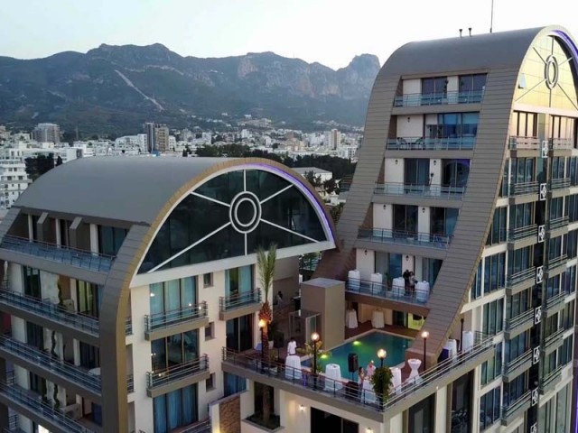 ULTRA LUXURY 2+1 APARTMENT FOR SALE IN GIRNE/CENTER WITH FULL LUXURY FURNISHED POOL-GYM-HAMMAM-SAUNA..