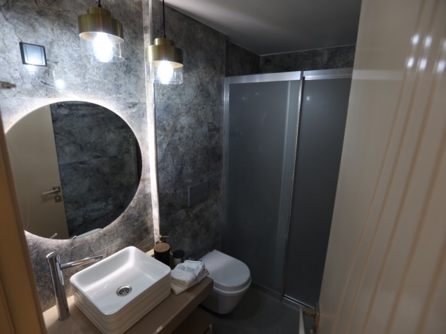 ULTRA-LUXUS-1+1-WOHNUNG ZUM VERKAUF IN GİRNE/ZENTRUM, NEBEN DEM COLONY HOTEL, VOLLSTÄNDIG MÖBLIERT MIT POOL-GYM-HAMAM..0533 859 21 66