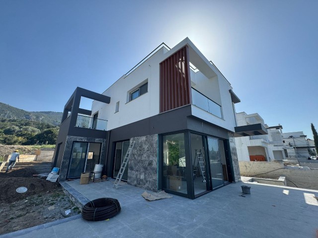 4+1 VILLA FOR SALE IN BELLAPAİS WITH PRIVATE POOL, LUX DESIGN AND MOUNTAIN AND SEA VIEW