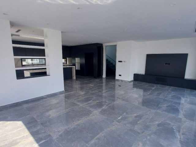 4+1 VILLA FOR SALE IN ÇATALKÖY, STUNNING STRUCTURE AND READY TO MOVE IN NEW VILLA Ground floor - Living room + kitchen open plan - guest wc - bedroom + wc/shower 1st floor - 2 bedrooms - 1 master bedroom + closet room + ensuite - Shared bathroom/WC 2nd floor - Laundry room Roof terrace Suspended cei