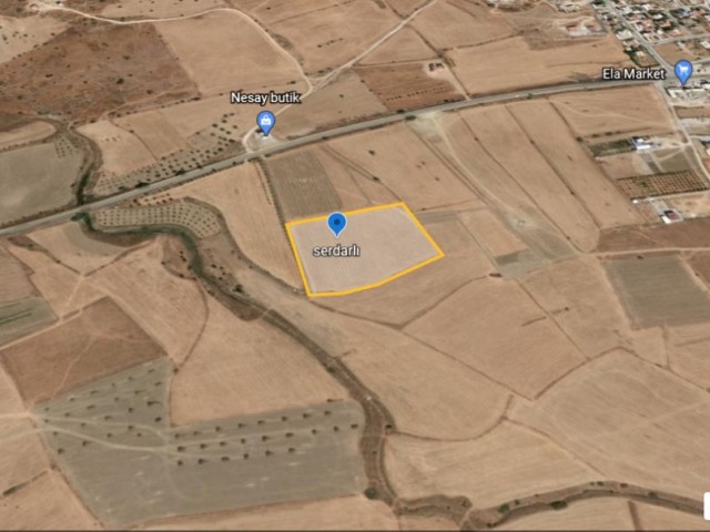 A PARCEL ON THE MAIN ROAD IN THE MAGUSA SERDARLI DISTRICT IS A 12-ACRE LAND PLOT FOR SALE FOR SALE ON DEC 96 TURKISH KOCANLI ROAD.15.500 STG PER ACRE ** 