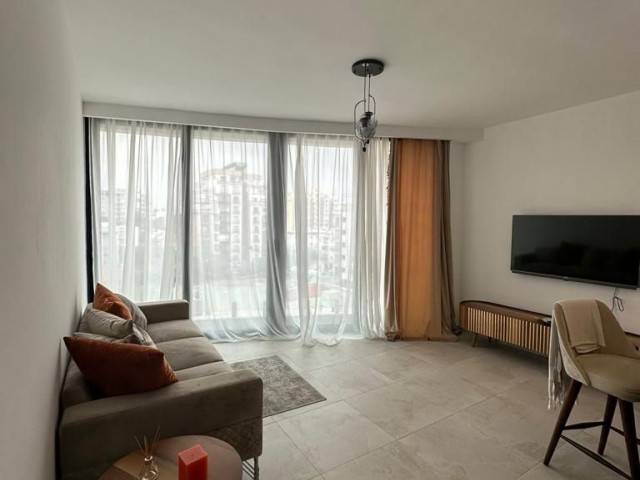 Продается полностью меблированная квартира 1+1 в центре Кирении, участок Перла. 