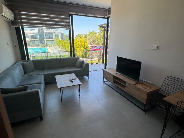 2+1 garden flat with shared pool for sale in Alsancak!