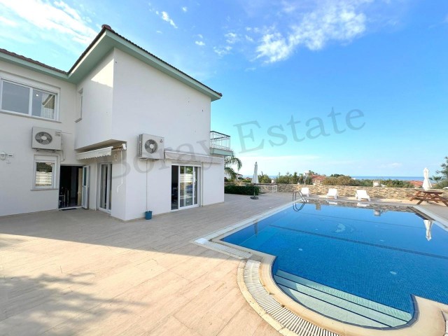 3 Bedroom Luxury Villa with Sea View and Pool in Çatalköy It has 260m2 Usage Area in a 734m2 Land