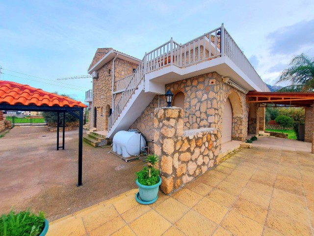 Luxury 4+2 stone detached villa with pool,  water well and generator for rent in Kyrenia in the region of karsiyaka  walking distance to the sea.  