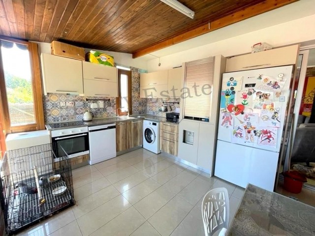 Ground floor, 2+1 spacious flaat with garden for sale in Alsancak , Escape beach area