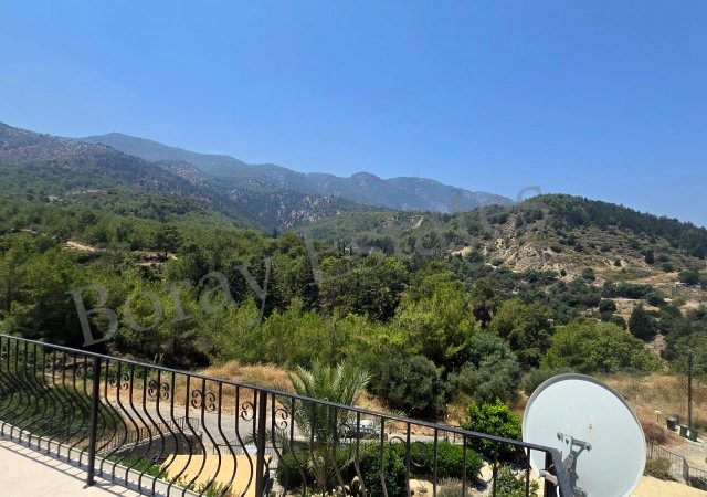 3+1 Villa with Pool on 750m2 Land with Magnificent Sea and Mountain View in Alsancak