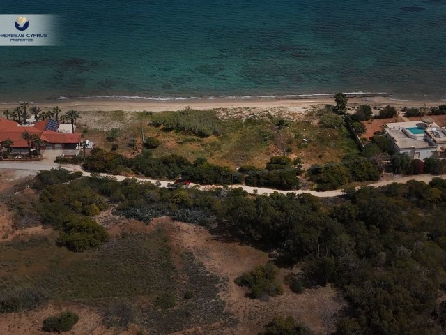 Located at the Seafront, with Commercial and Residential Permits, with a Road, 2 Acres of 1 Evlek Land with Perfect Location for sale, whether for villa or investment!