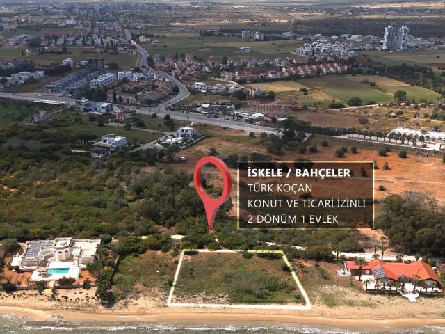 Located at the Seafront, with Commercial and Residential Permits, with a Road, 2 Acres of 1 Evlek Land with Perfect Location for sale, whether for villa or investment!