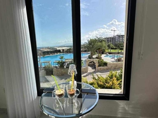 Next to Lord Palace Hotel in Girne New Port, open for vehicle exchange, for sale 1+1 apartment with commercial permit.