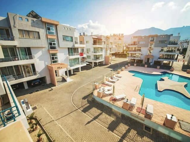 3+1 fully furnished flat for sale in Kyrenia Center. IN THE SITE WITH POOL