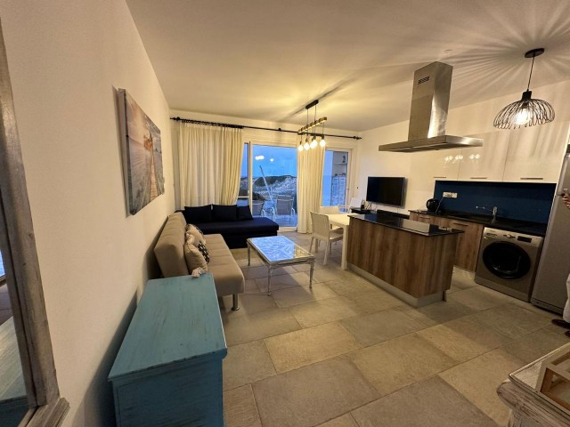 1+1 seafront flat for sale in Esentepe