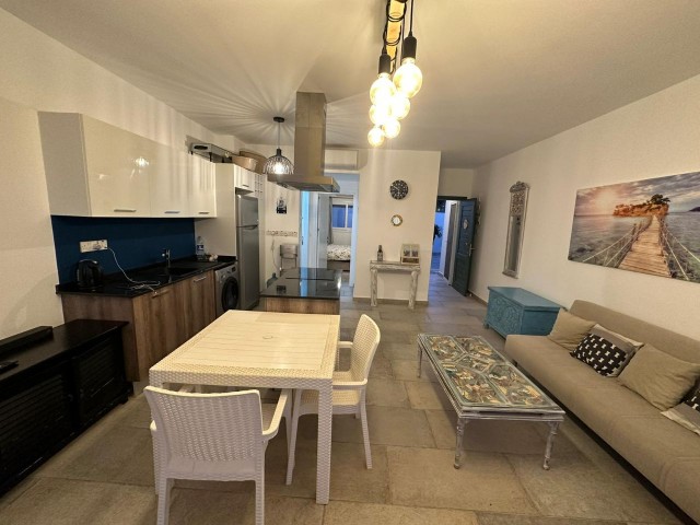 1+1 seafront flat for sale in Esentepe