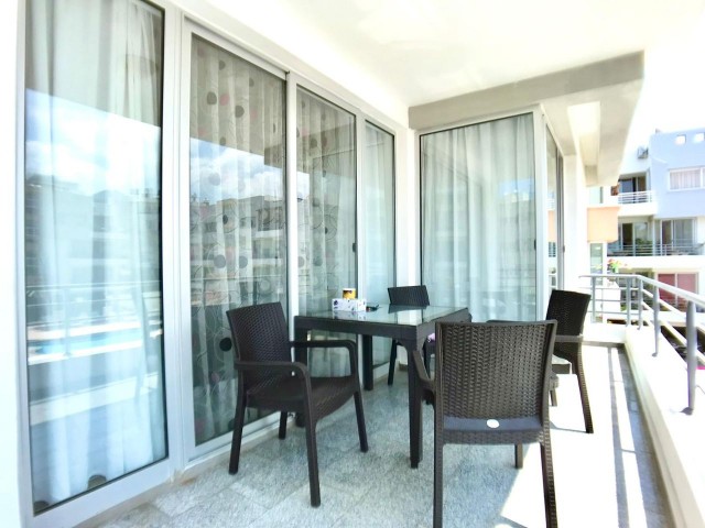 138 M2 3+1 FULLY FURNISHED FLAT FOR SALE IN KYRENIA CENTER, IN A SITE WITH POOL