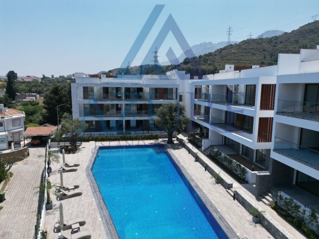 Penthouse in a 2+1 complex with pool for sale in Alsancak