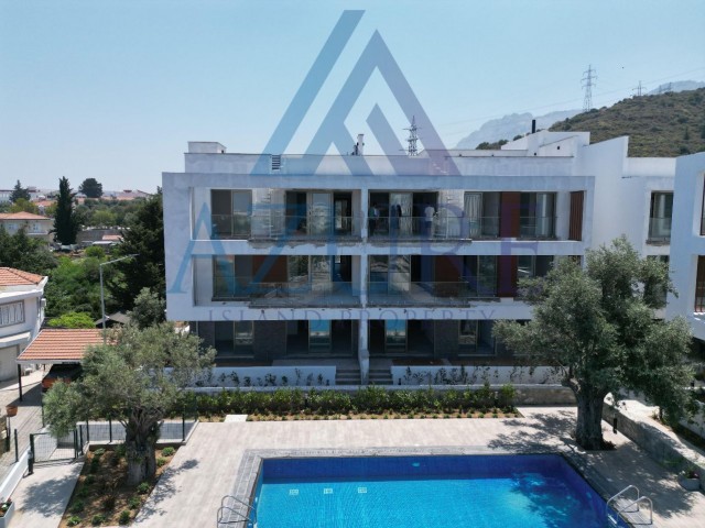 Penthouse in a 2+1 complex with pool for sale in Alsancak