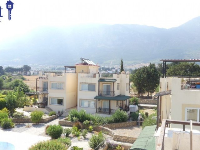 APARTMENT WITH A PRIVATE ROOF TERRACE AND COMMUNAL POOL ON A POPULAR SITE IN LAPTA.