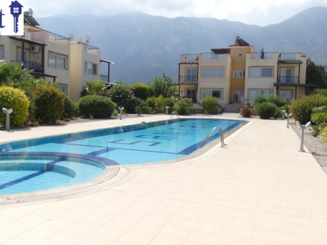 APARTMENT WITH A PRIVATE ROOF TERRACE AND COMMUNAL POOL ON A POPULAR SITE IN LAPTA.