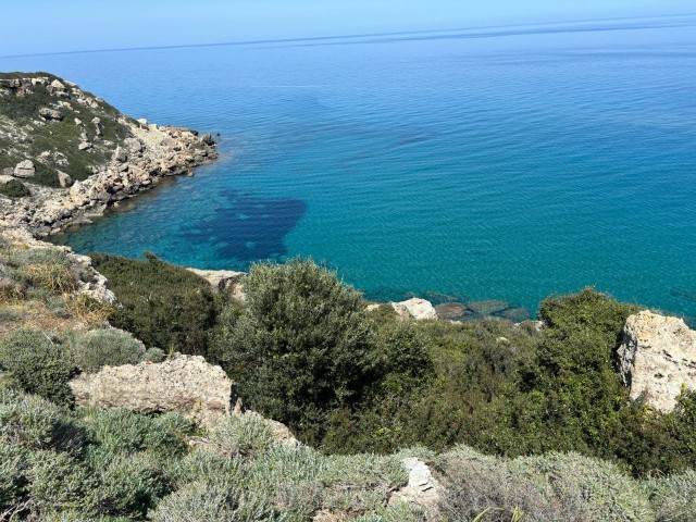 Grundstück zum Verkauf mit atemberaubendem Meer- und Bergblick