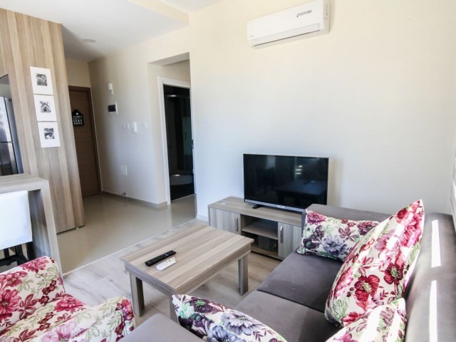 Girne merkezde 1+1 satılık deniz manzaralı daire