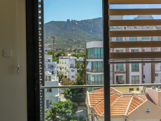 2 + 1 RENT-GUARANTEED APARTMENT WITH AN ENSUITE BATHROOM IN THE CENTER OF KYRENIA ** 