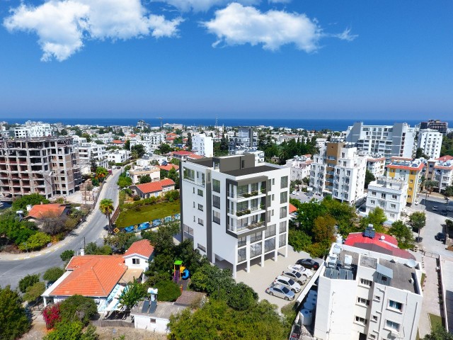 1 + 1 apartment for sale with full furniture rental guarantee in the center of Kyrenia