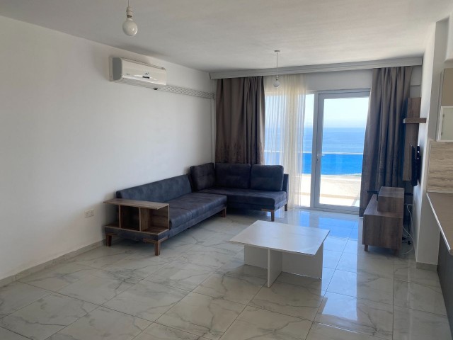 GIRNE, 2+1 GENİŞ BALKON DENİZ MANZARALI, FULL EŞYALI, ÇARŞI ÇOK YAKIN.