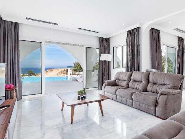 GIRNE, ESENTEPE, 3+1 VILLA, ON THE SEAFRONT, WITH UNIQUE SEA AND MOUNTAIN VIEWS, FULLY FURNISHED 