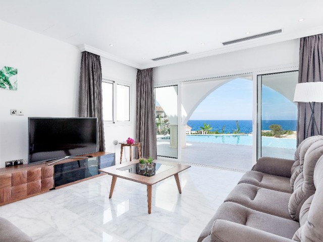 GIRNE, ESENTEPE, 3+1 VILLA, ON THE SEAFRONT, WITH UNIQUE SEA AND MOUNTAIN VIEWS, FULLY FURNISHED 