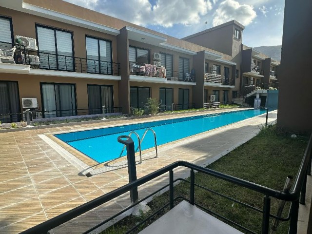 LUXURY FLAT WITH CLOSED PARKING CAMERA SYSTEM AND COMMON POOL IN GIRNE DOĞANKÖY.