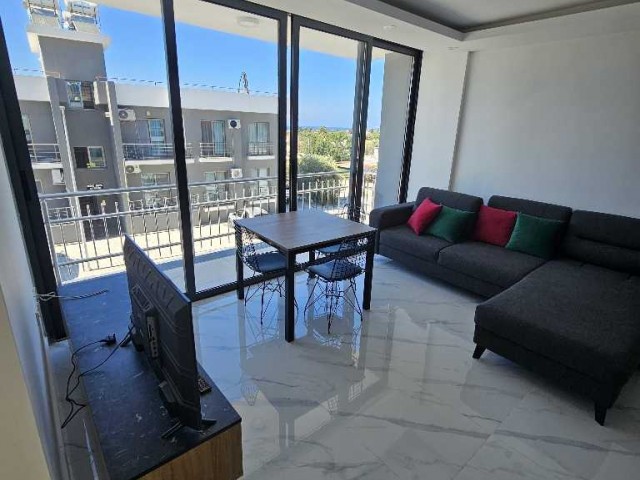 2+1 FLAT FOR RENT WITHIN THE SITE WITH POOL AND CLOSED PARKING PARKING