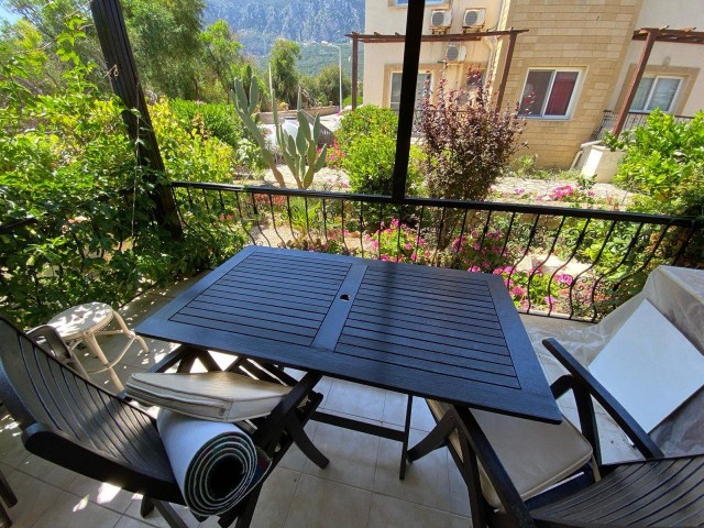 3+1 Apartment with Garden and Shared Pool for Sale in Lapta, Like a Detached Villa