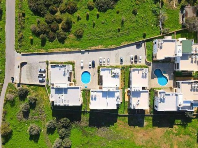 Furnished 3+1 Flat for Sale in a Site with a Pool Close to the Center of Kyrenia