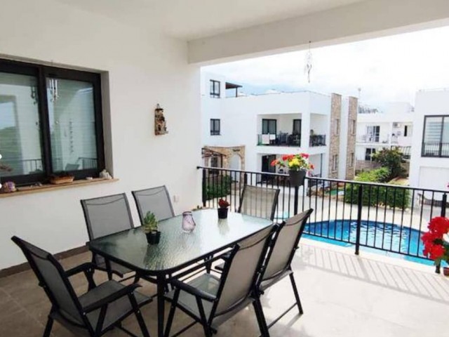 Furnished 3+1 Flat for Sale in a Site with a Pool Close to the Center of Kyrenia