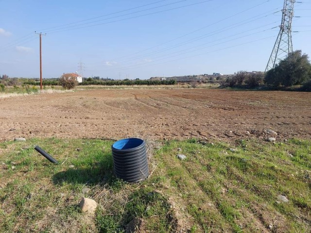 2 acres of land with sea view, asphalt road and water is for sale in Cengizköy/LEFKE. 05428800222