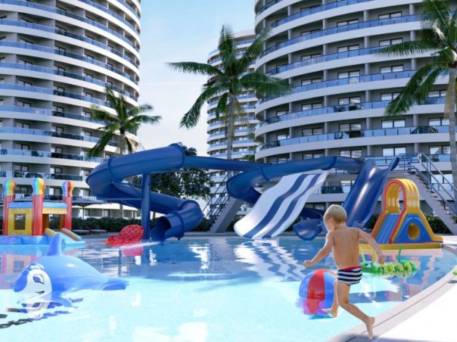 Wohnung zum Verkauf aus einem 1+1-Penthouse-Projekt im Iskele Loungbeach-Bereich HABIBE ÇETİN 05338547005