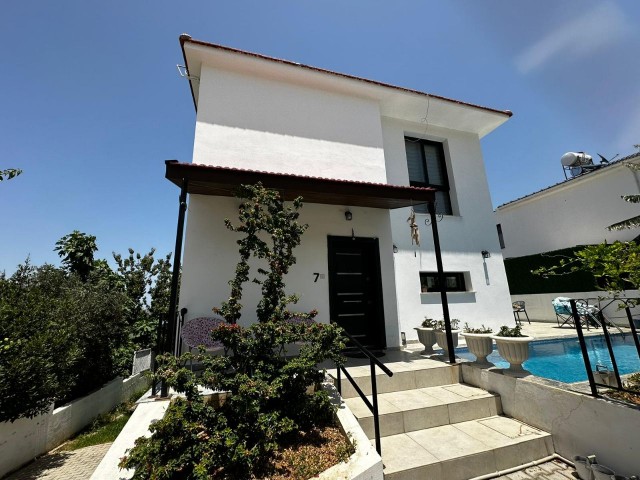 3+1 Villa for sale with a utility room and wonderful sea view in Çatalköy