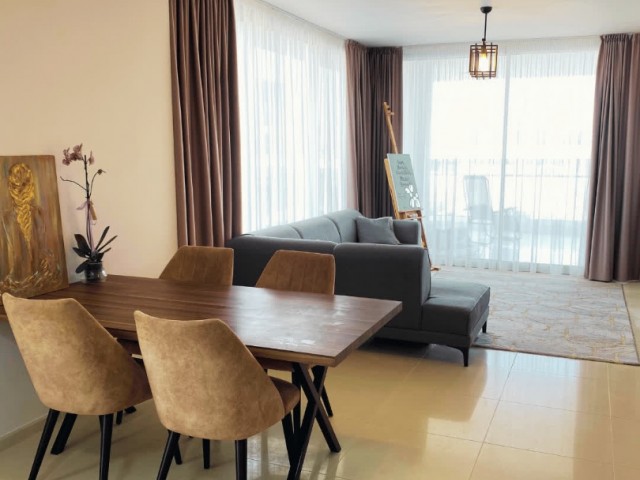 2+1 in Abelia Residence complex with a sea view, spacious terraces accessible from all rooms, and a bathroom