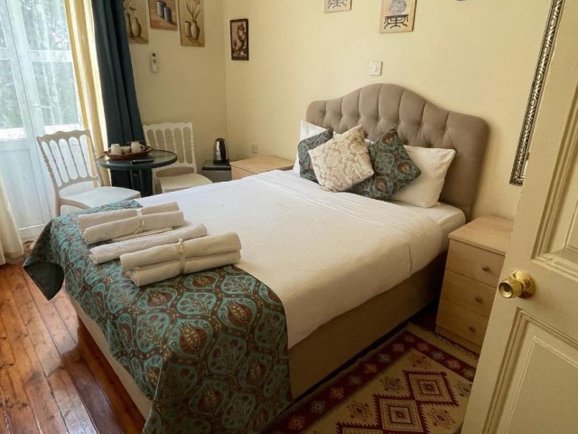 HISTORICAL HOUSING WITH BOUTIQUE HOTEL SERVICE IN THE ANCIENT PORT OF KYRENIA BY THE OWNER ** 