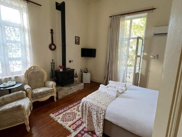 HISTORICAL HOUSING WITH BOUTIQUE HOTEL SERVICE IN THE ANCIENT PORT OF KYRENIA BY THE OWNER ** 