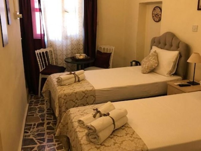 HISTORICAL HOUSING WITH BOUTIQUE HOTEL SERVICE IN THE ANCIENT PORT OF KYRENIA BY THE OWNER ** 