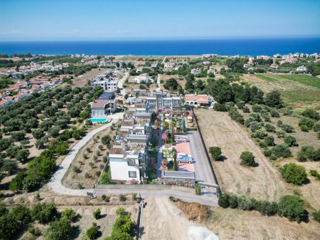 İKİ YATAK ODALI BAHÇELİ VE TERASLI DAİRELER