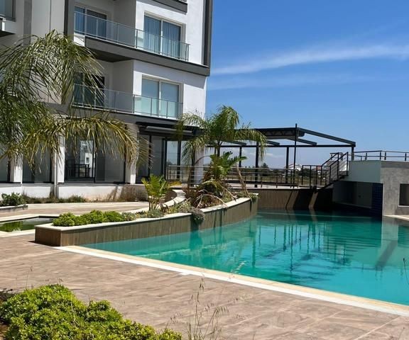 1+1 Apartment for Sale in a Complex with Pool in Iskele Bahceler Region