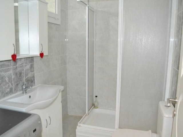 An APARTMENT FOR SALE with A Rental Income of 2 + 1 on a Site with a Shared Pool in Karaoglanoglu S District! ** 