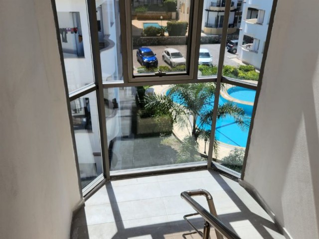 2+1 Fully Furnished Ground Floor Sea View Flat in a Complex with Pool in Alsancak