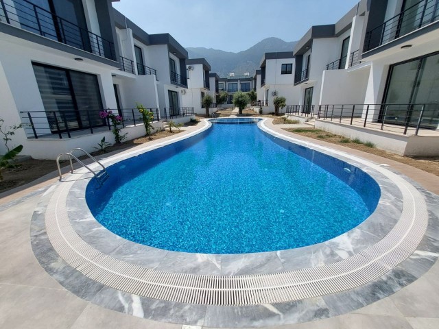 Apartment mit Berg- und Meerblick und Gemeinschaftspool zum Verkauf in Lapda