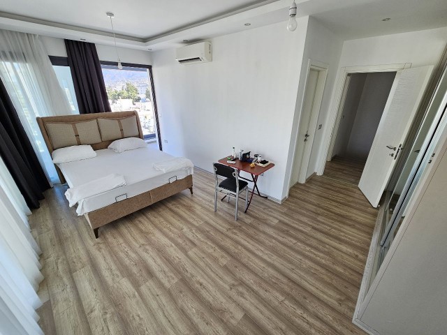 Fully Furnished 3+1 Penthouse for Rent in Kyrenia Center with Mountain and Sea Views