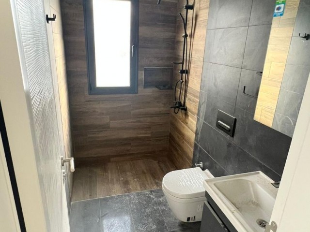 Neue 2+1 Luxuswohnung mit Gemeinschaftspool zum Verkauf in Alsancak